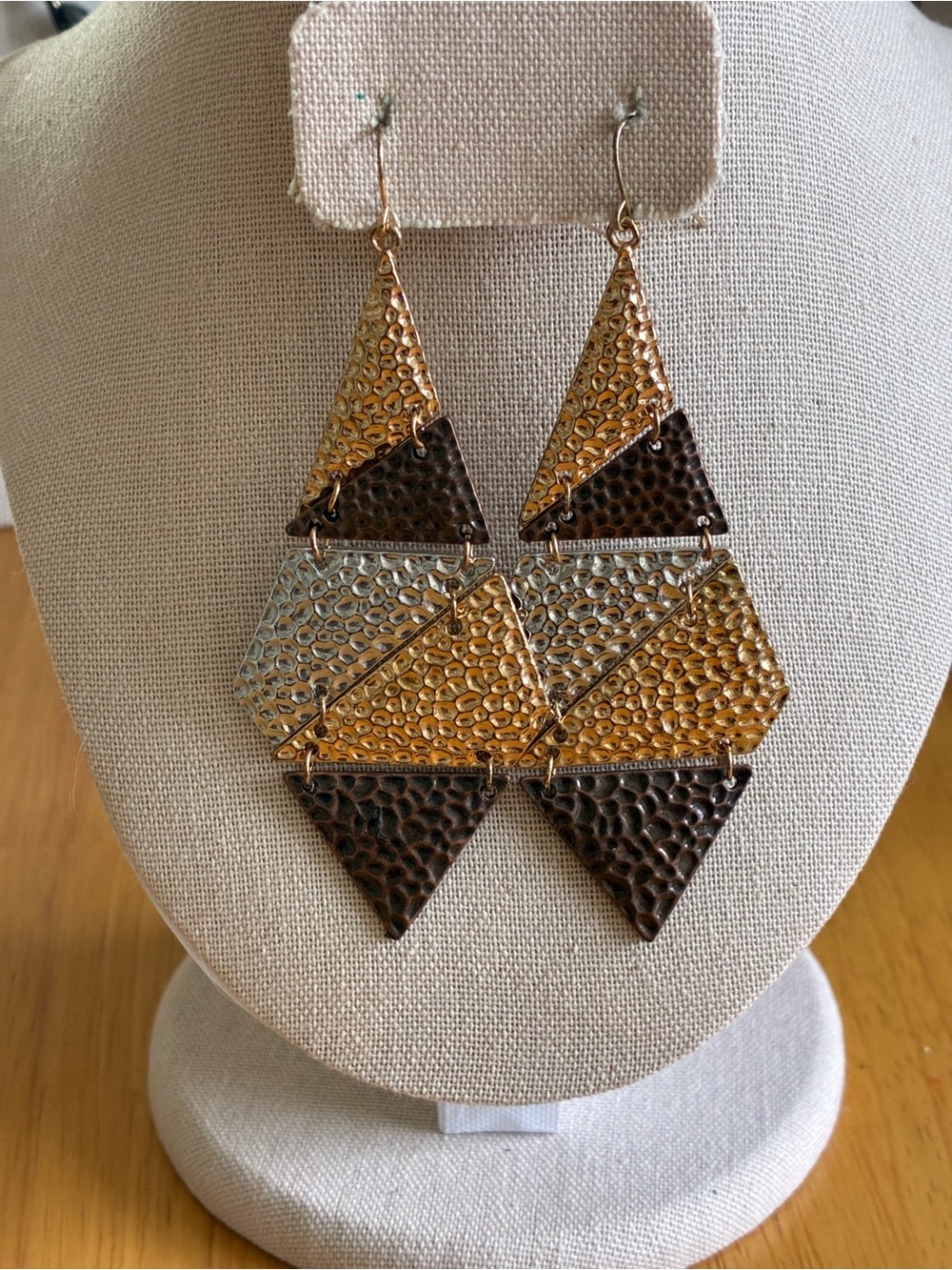 Unbranded patina-brass toned cascade earrings.